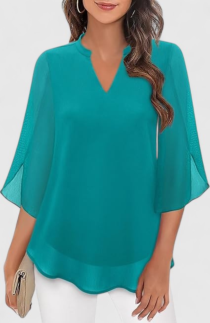 Celinora comfortable blouse by Isabel y Miguel Madrid, featuring soft fabric and relaxed fit, displayed on a hanger.