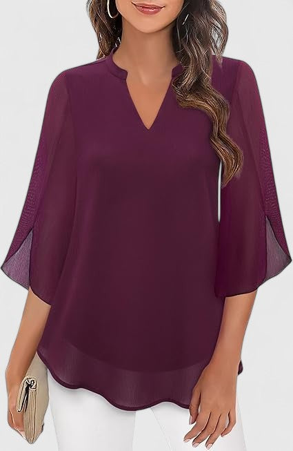 Isabel y Miguel Madrid Celinora comfortable blouse in soft fabric, shown with long sleeves and relaxed fit on model.