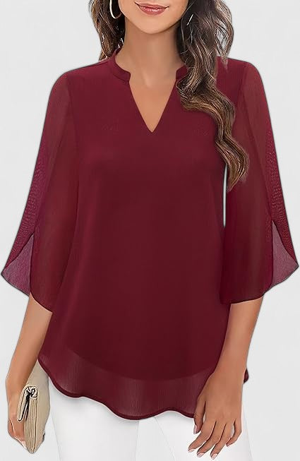 Celinora comfortable blouse by Isabel y Miguel Madrid featuring soft fabric and relaxed fit, displayed on a hanger.