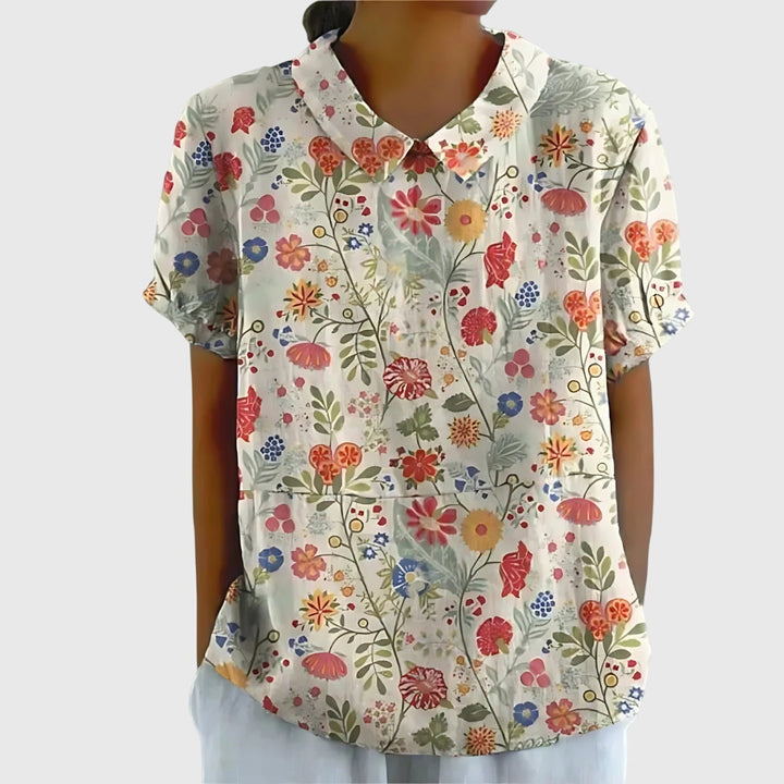 Jenna™ floral blouse by Isabel y Miguel Madrid featuring a lightweight fabric with colorful floral print and a relaxed fit.