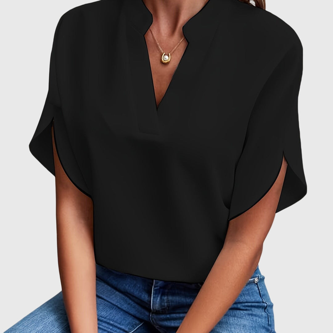Elegant Kristie™ blouse by Isabel y Miguel Madrid, featuring stylish fabric and a sophisticated design for fashionable wear.