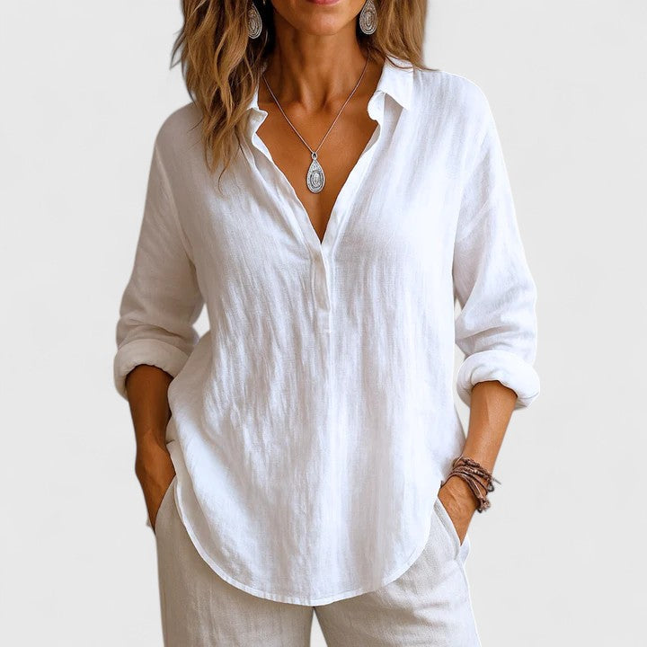 Isabel y Miguel Madrid Franzina linen blouse with relaxed fit, lightweight fabric, and stylish design for casual wear.