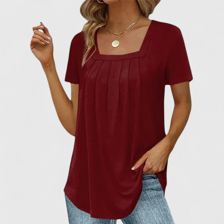 Lenabria summer shirt for women by Isabel y Miguel Madrid, featuring light fabric and elegant design, perfect for warm weather.