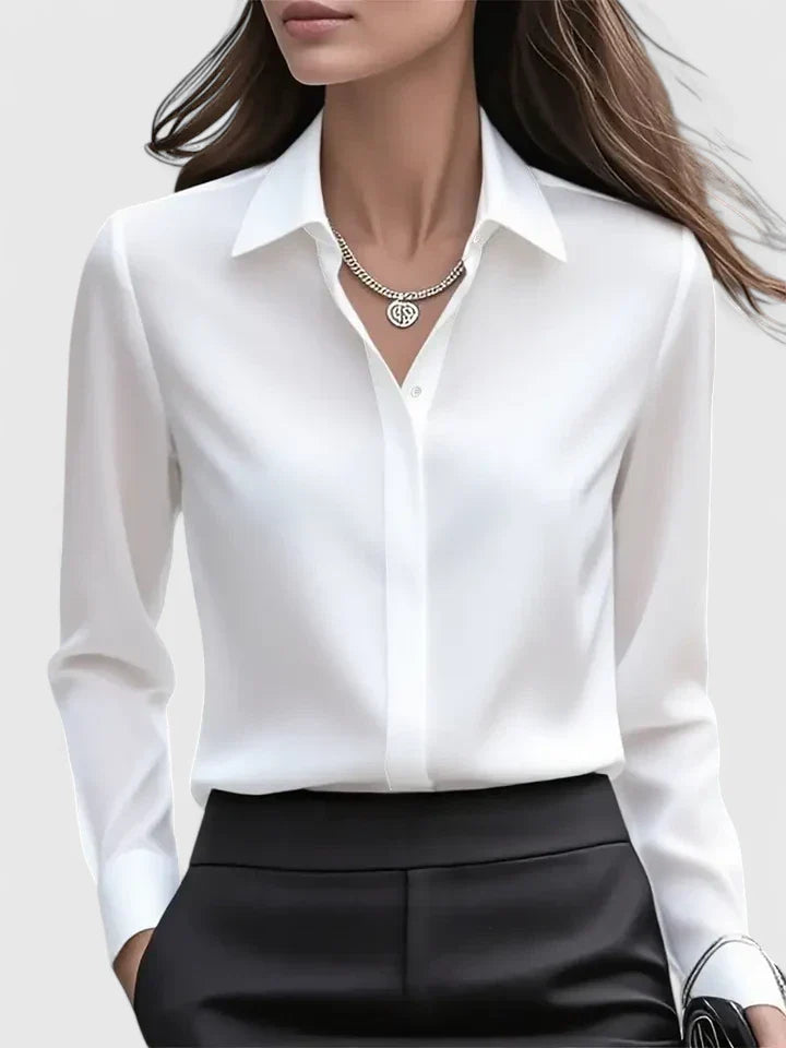 Elegant black top from Isabel y Miguel Madrid, featuring a stylish design and fitted silhouette, ideal for sophisticated outfits.