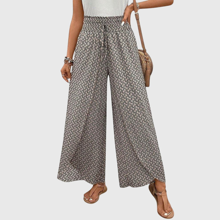 Pantalones Palazzo elegantes Chiara de Isabel y Miguel Madrid, en color neutro, con diseño fluido y cómodo para mujer.
