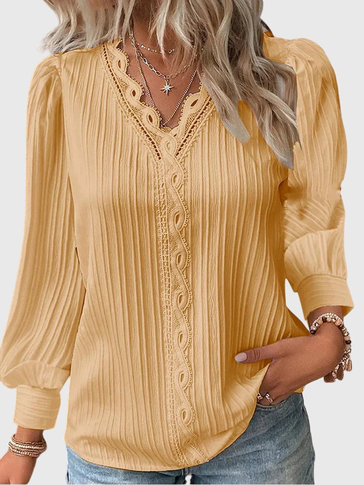 Andrea™ elegant jersey blouse by Isabel y Miguel Madrid, shown in a close-up of the soft fabric and stylish fit.