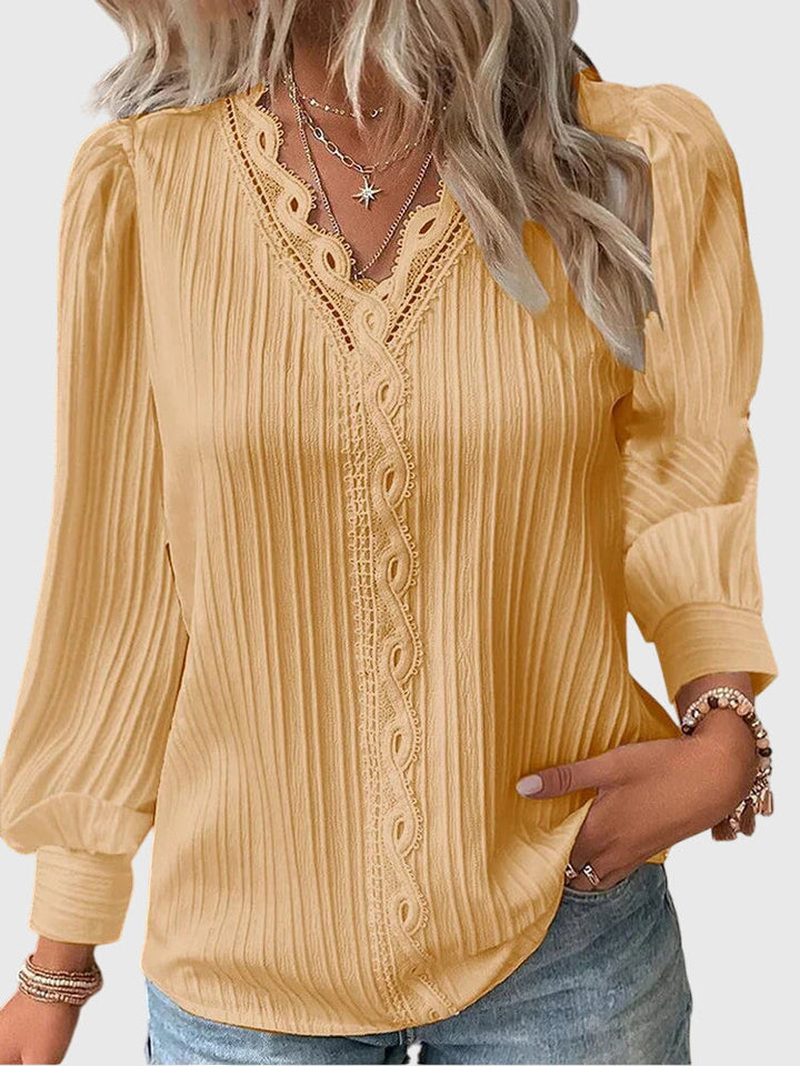 Andrea™ elegant jersey blouse by Isabel y Miguel Madrid, shown in a close-up of the soft fabric and stylish fit.