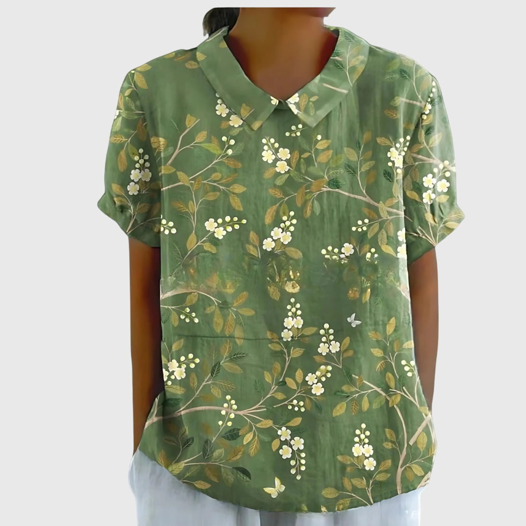 Jenna™ floral blouse by Isabel y Miguel Madrid featuring a lightweight fabric and vibrant floral pattern.