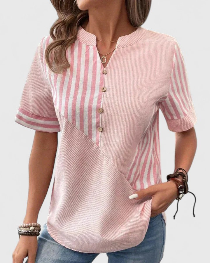 Isabel y Miguel Madrid Gigi sophisticated blouse in soft fabric, featuring a stylish collar and elegant design.