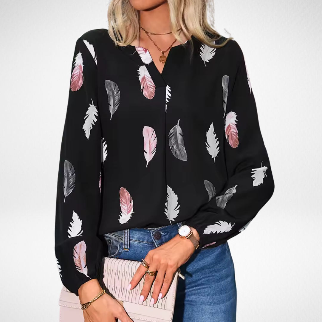 Nicole™ ajustable blouse by Isabel y Miguel Madrid, featuring a fitted design and stylish fabric in a close-up view.