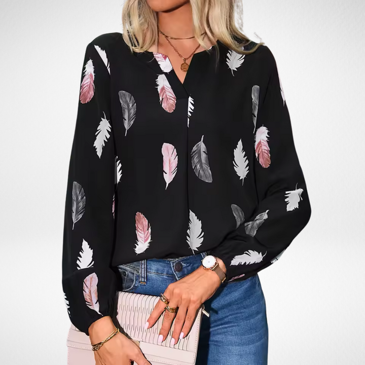 Nicole™ ajustable blouse by Isabel y Miguel Madrid, featuring a fitted design and stylish fabric in a close-up view.