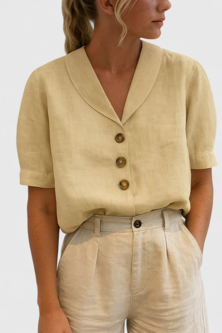 Elegant Isabel y Miguel Madrid Charlie blouse in soft fabric, featuring a classic design and subtle detailing.