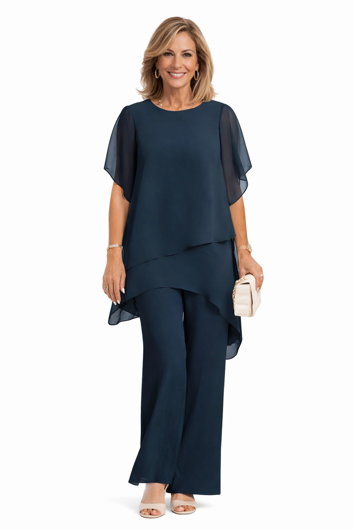 Conjunto elegante fluido Carmen de Isabel y Miguel Madrid, con blusa y pantalón en tonos neutros, estilo sofisticado y cómodo.