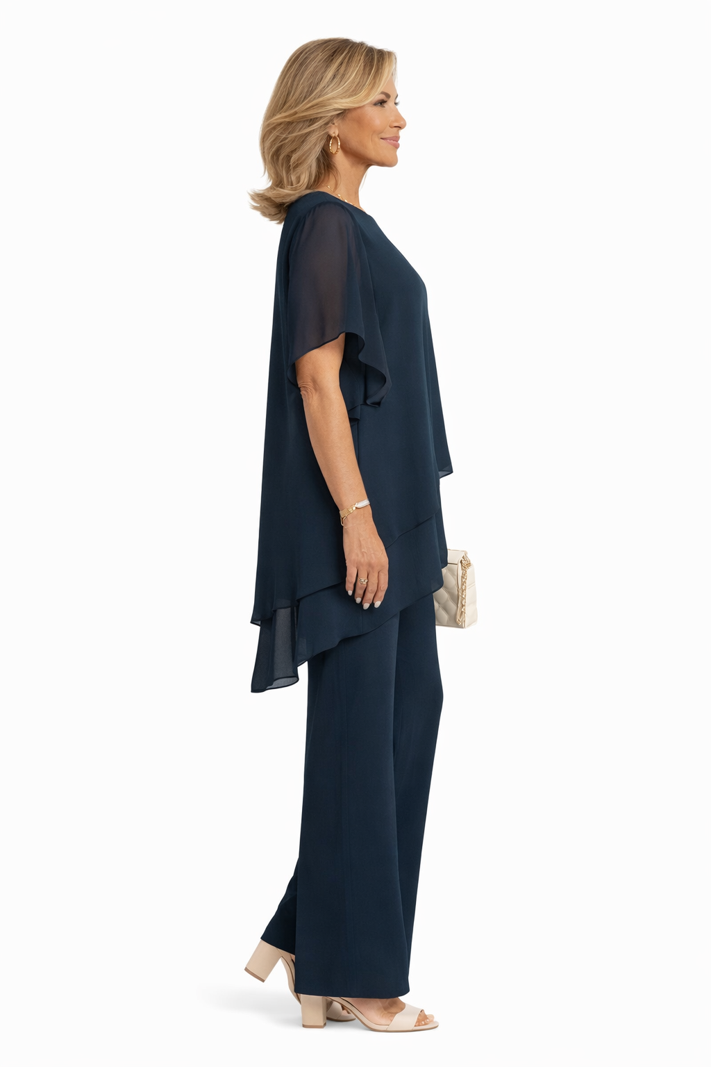 Conjunto elegante fluido Carmen de Isabel y Miguel Madrid, vestido con detalles sofisticados y estilo moderno.