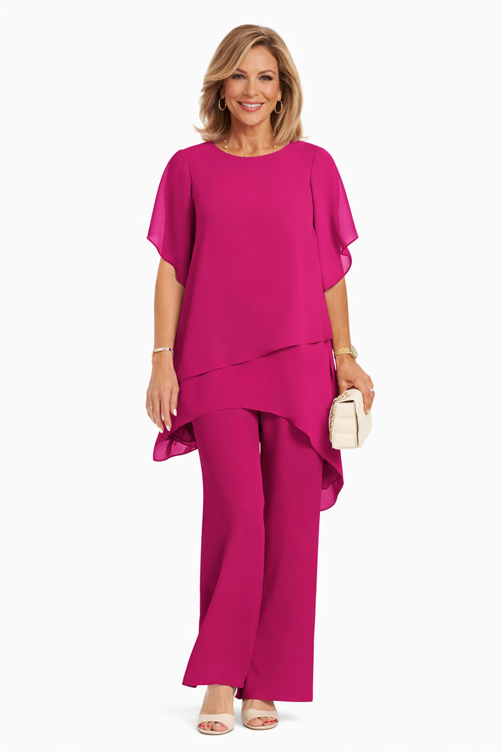 Conjunto elegante Carmen de Isabel y Miguel Madrid, tela fluida y diseño sofisticado en tono neutro.