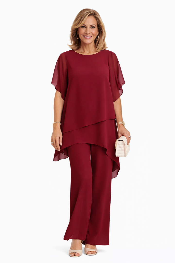 Conjunto elegante fluido Carmen de Isabel y Miguel Madrid, con blusa y pantalones en tela suave y diseño sofisticado.