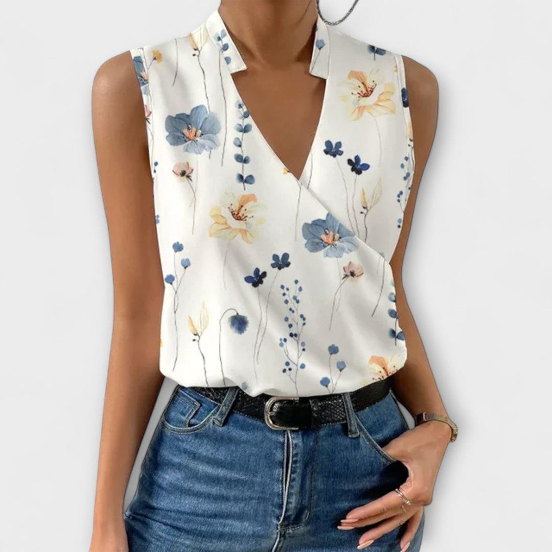 Isabel y Miguel Madrid Loretta women’s sleeveless V-neck top with print, casual summer blouse in white.