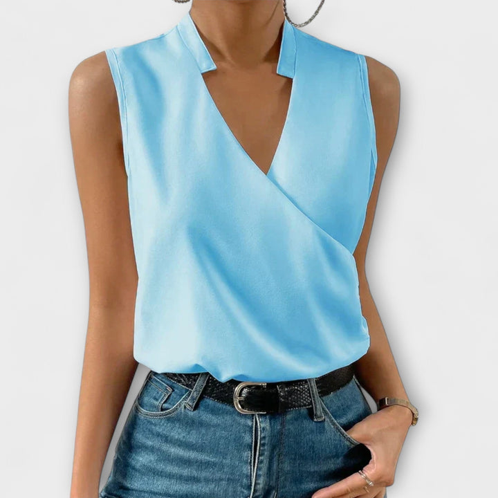 Isabel y Miguel Madrid Loretta women’s sleeveless V-neck top with printed pattern, casual summer tank in white fabric.