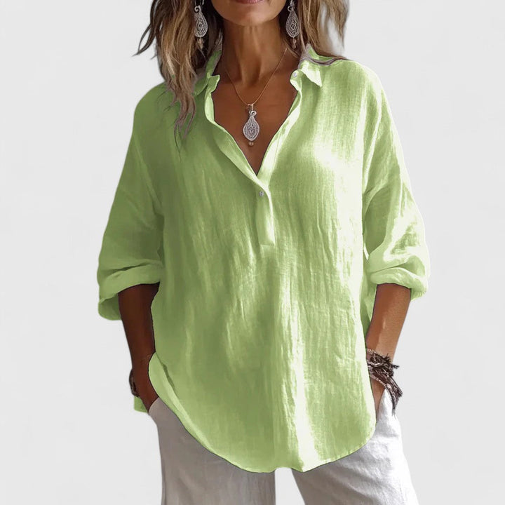 Elegant Roxanna blouse by Isabel y Miguel Madrid, featuring a chic design with stylish fabric and intricate details.