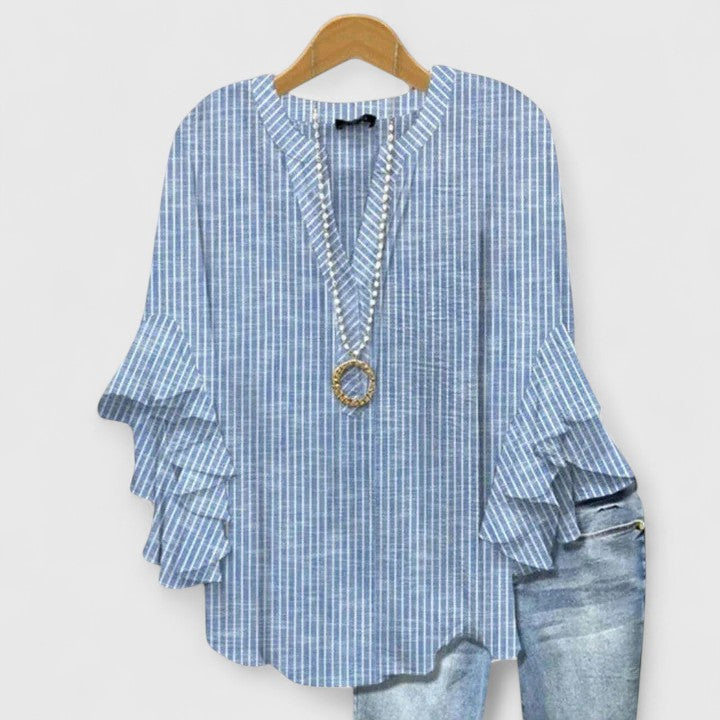 Elegant Isabel y Miguel Madrid Taylisse blouse with a stylish design, featuring a flattering fit and sophisticated details.
