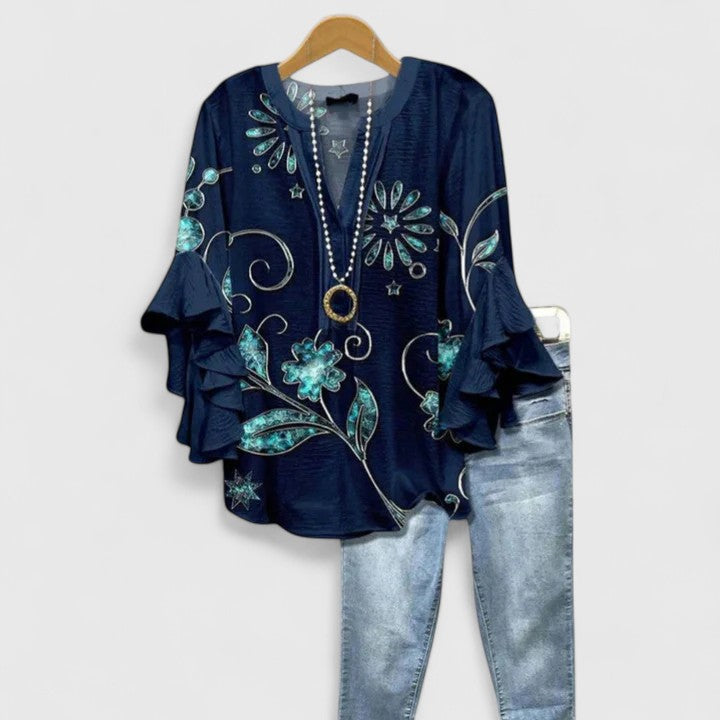 Comfortable Isabel y Miguel Madrid Saryphiah blouse in soft fabric, displayed on a neutral background with a relaxed fit.
