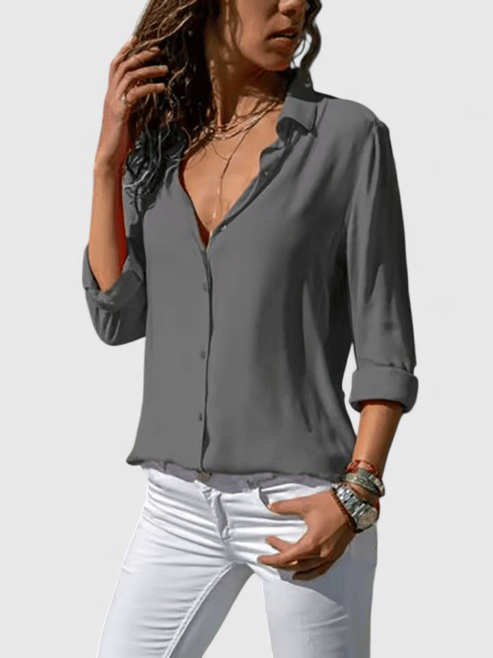 Elegant Aveline blouse by Isabel y Miguel Madrid, featuring stylish fabric and tailored fit, shown on a mannequin.