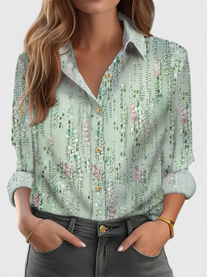 Elegant Margot blouse by Isabel y Miguel Madrid featuring a stylish design and feminine fit, shown in a close-up image.