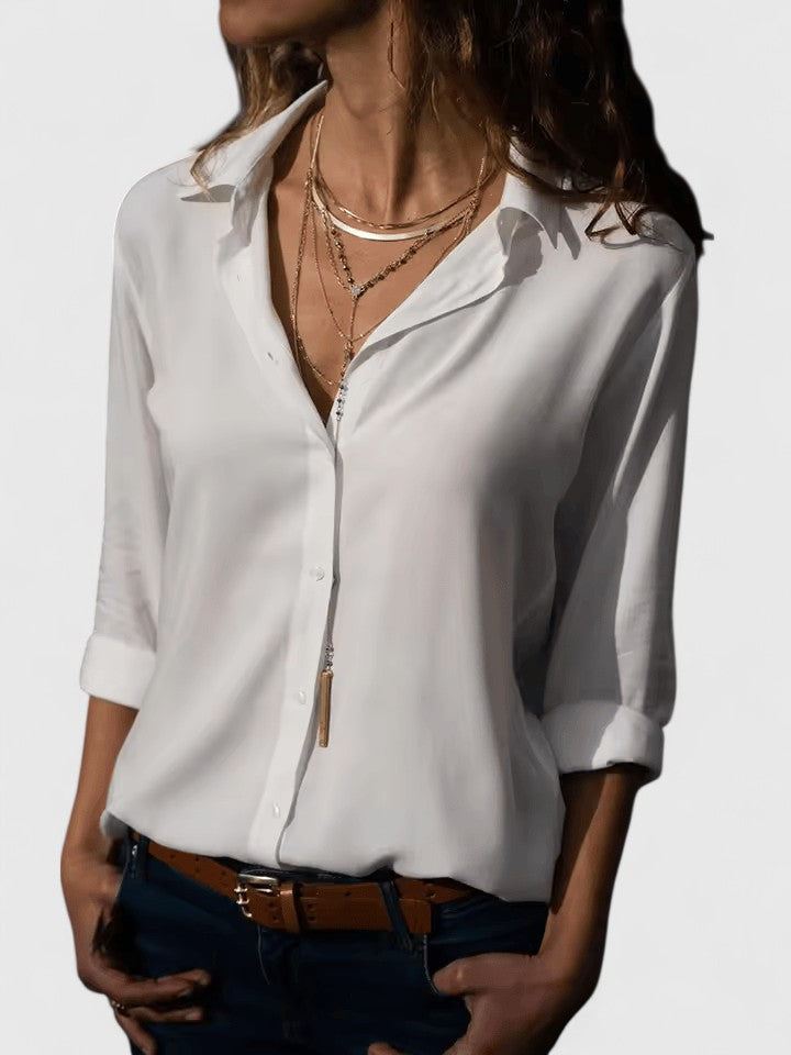 Elegant Aveline blouse by Isabel y Miguel Madrid, stylish women's top with detailed fabric and modern design.