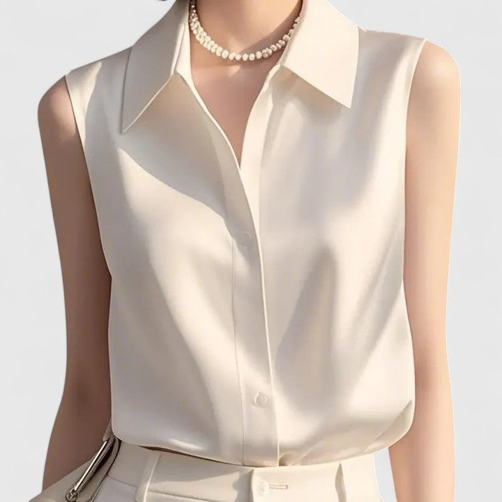 Elegant Isabel y Miguel Madrid Lavinia blouse featuring sophisticated design, shown in a stylish, well-fitted silhouette.