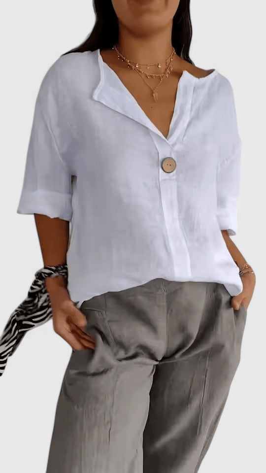 Elegant Kianna blouse by Isabel y Miguel Madrid, featuring a stylish design perfect for sophisticated looks.