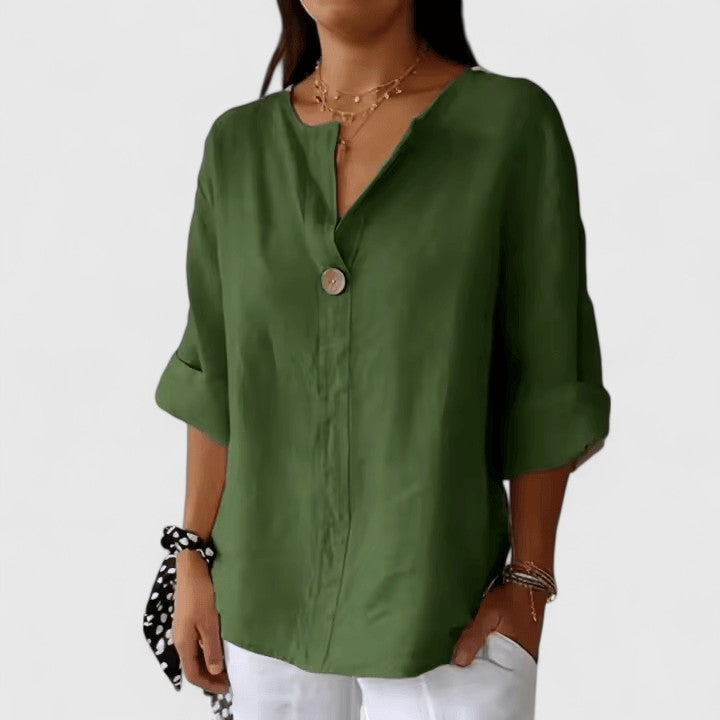 Elegant Isabel y Miguel Madrid Kianna blouse in soft fabric, featuring a stylish neckline and tailored fit, perfect for sophisticated looks.