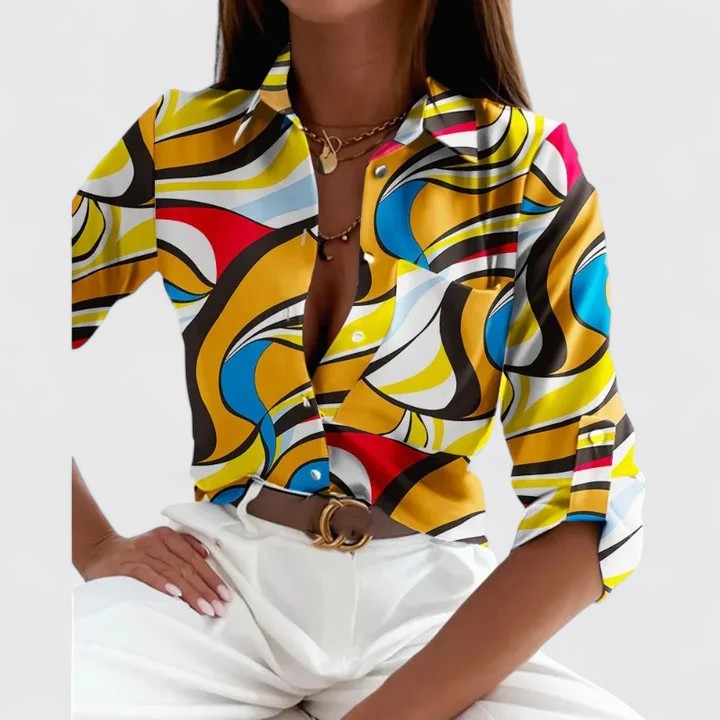 Elegant Lisette long sleeve blouse by Isabel y Miguel Madrid, shown in a stylish, well-fitted design with a smooth fabric finish.