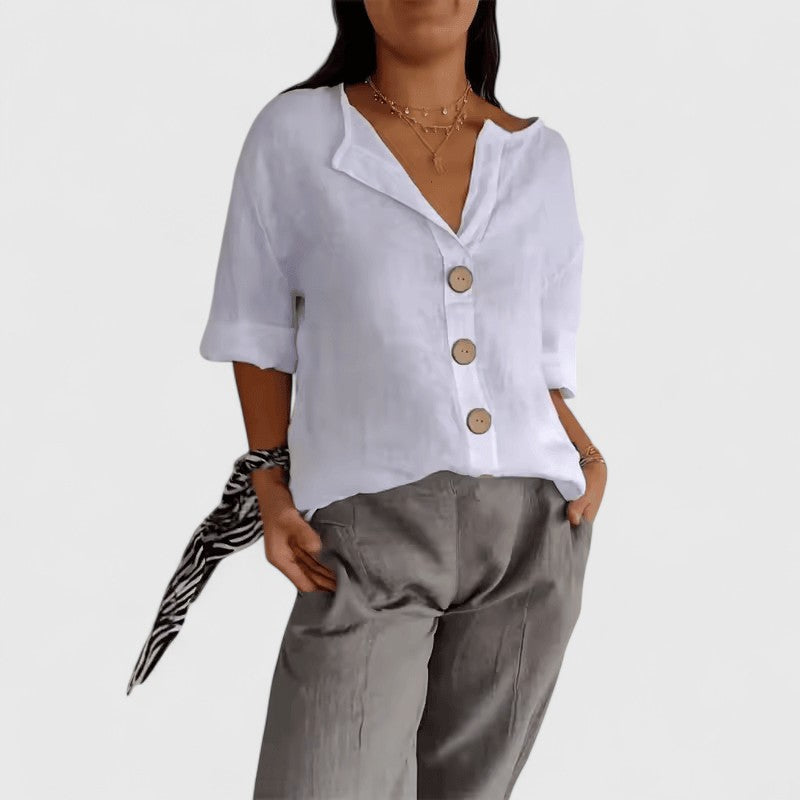 Elegant Isabel y Miguel Madrid Cathlyn blouse with stylish design, displayed on a neutral background.