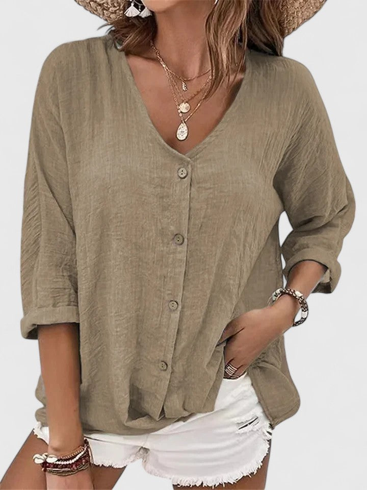 Kylie Isabel y Miguel Madrid elegant blouse, shown in a stylish design with soft fabric and a sophisticated fit.