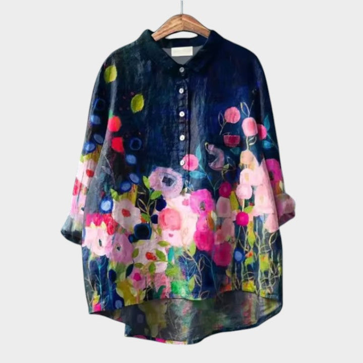 Elegant women's blouse from Isabel y Miguel Madrid featuring a stylish design, shown on a model with a neutral background.