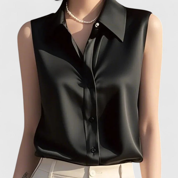 Elegant Isabel y Miguel Madrid blouse with sophisticated design, featuring a stylish fit and refined fabric details.