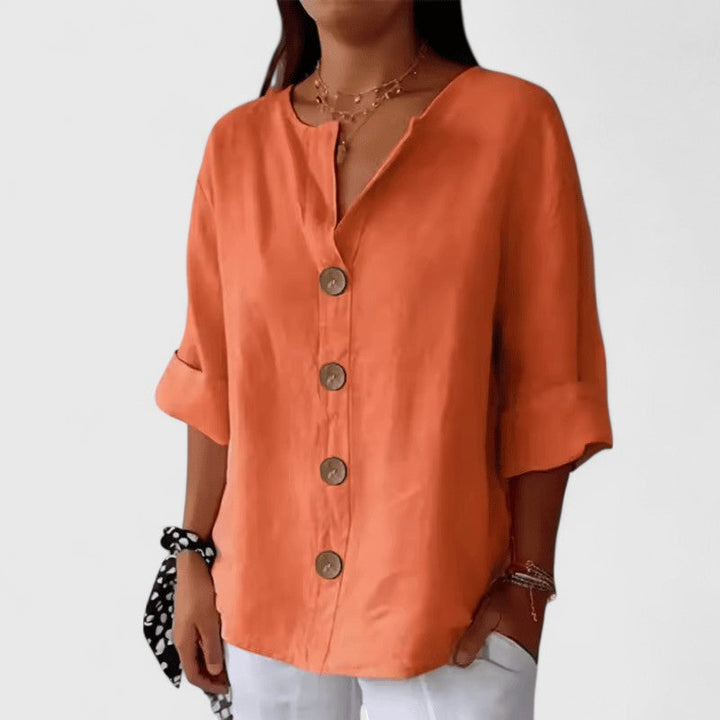 Elegant Isabel y Miguel Madrid Cathlyn blouse with stylish design, featuring a sophisticated fit and intricate details.