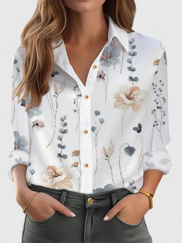 Elegant Margot blouse by Isabel y Miguel Madrid, featuring a stylish design in a close-up view of the fabric and details.