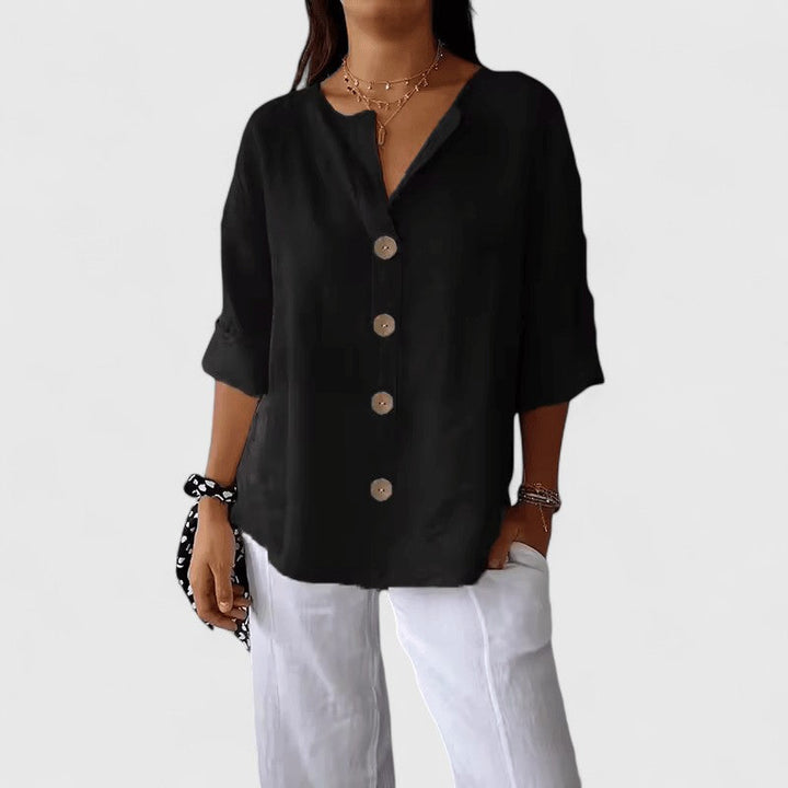 Elegant Isabel y Miguel Madrid Cathlyn blouse in stylish fabric, featuring a sophisticated design and tailored fit.