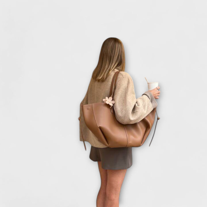 Brown Olivia tote bag by Isabel y Miguel Madrid featuring vintage leather design and spacious interior.