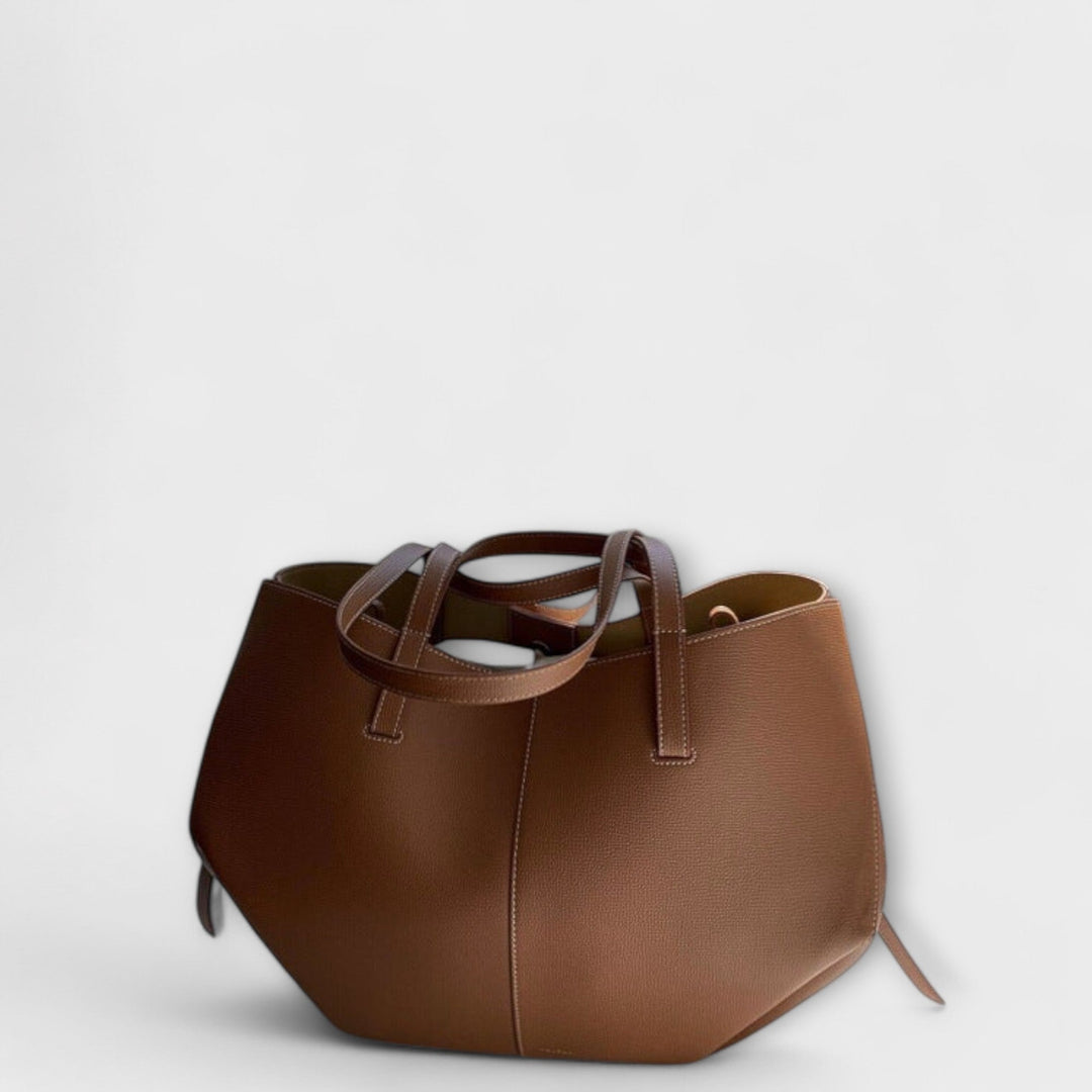 Olivia tote bag by Isabel y Miguel Madrid featuring vintage design, soft leather material, and spacious interior.