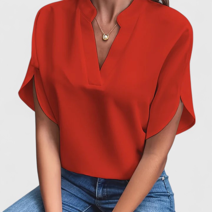 Elegant Isabel y Miguel Madrid women’s top with stylish design, featuring a sophisticated blouse for a chic look.