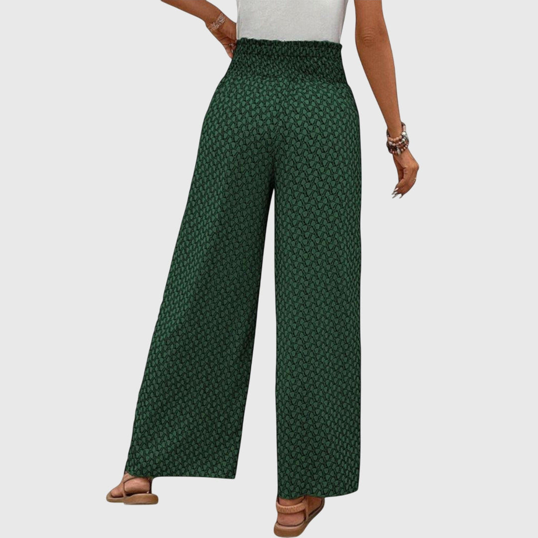 Pantalones Palazzo elegantes Chiara de Isabel y Miguel Madrid, en color oscuro, con diseño amplio y cómodo para mujer.