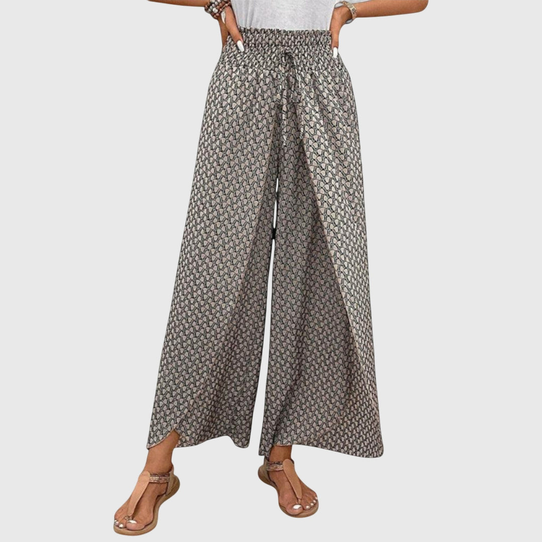 Pantalones palazzo elegantes Chiara de Isabel y Miguel Madrid, con tela fluida y diseño moderno para mujer.