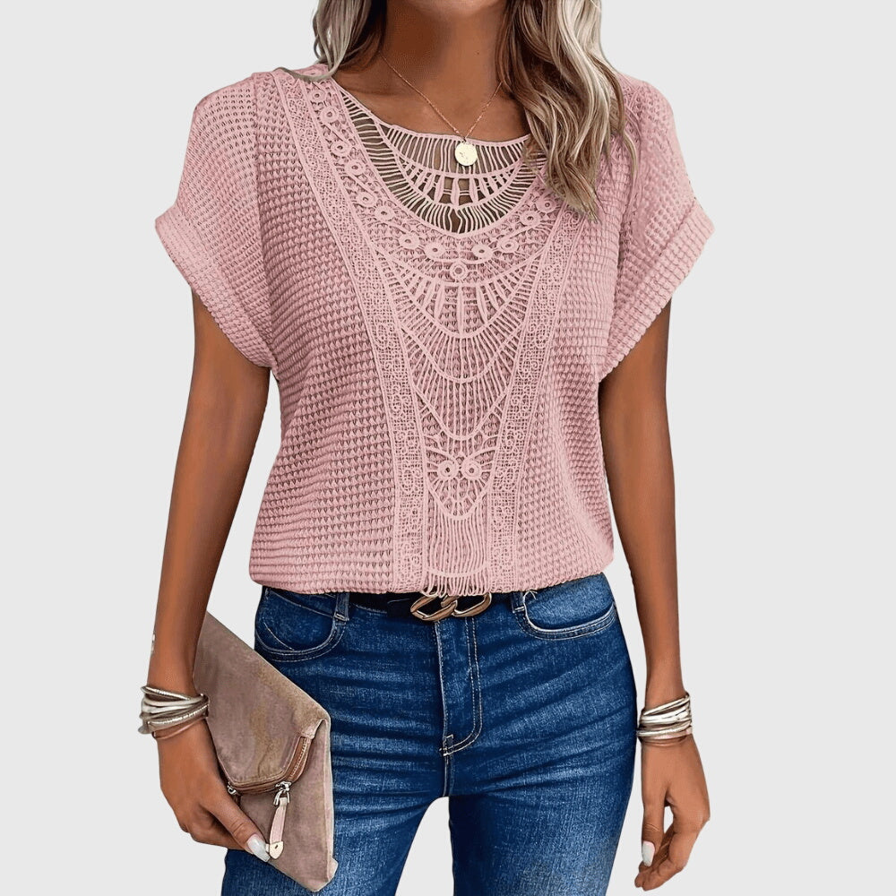 Isabel y Miguel Madrid Perla™ Ibiza style elegant blouse with flowing fabric and stylish design, perfect for casual or semi-formal wear.