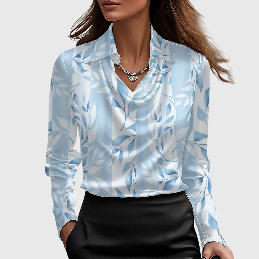Elegant Brooklyn™ blouse by Isabel y Miguel Madrid, featuring a stylish design and comfortable fit, shown in a close-up image.