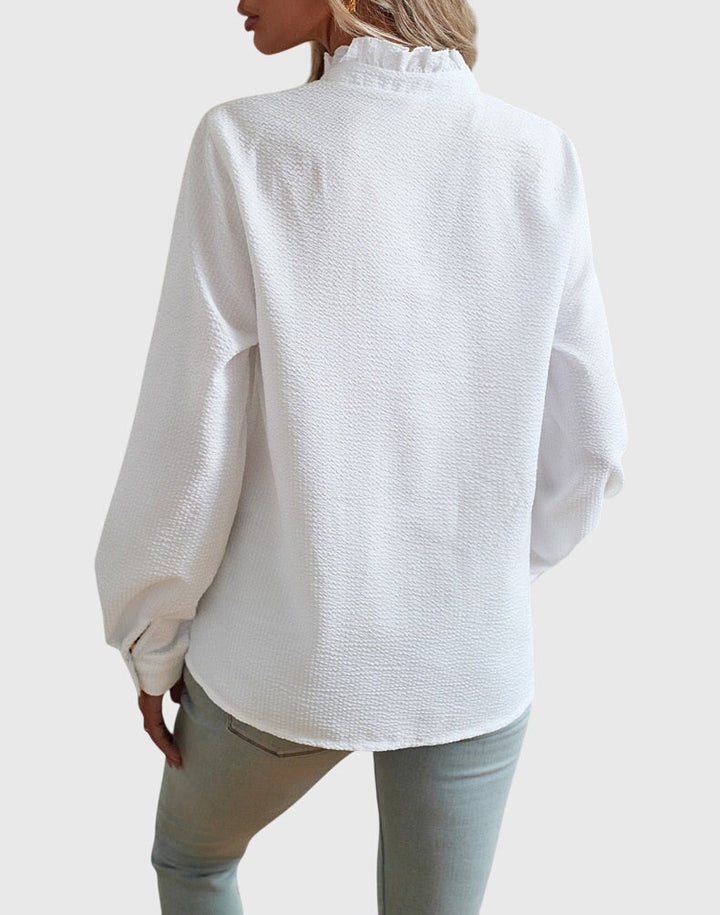 Elegant Kaitlyn™ blouse by Isabel y Miguel Madrid, featuring a stylish, sophisticated design in soft fabric.