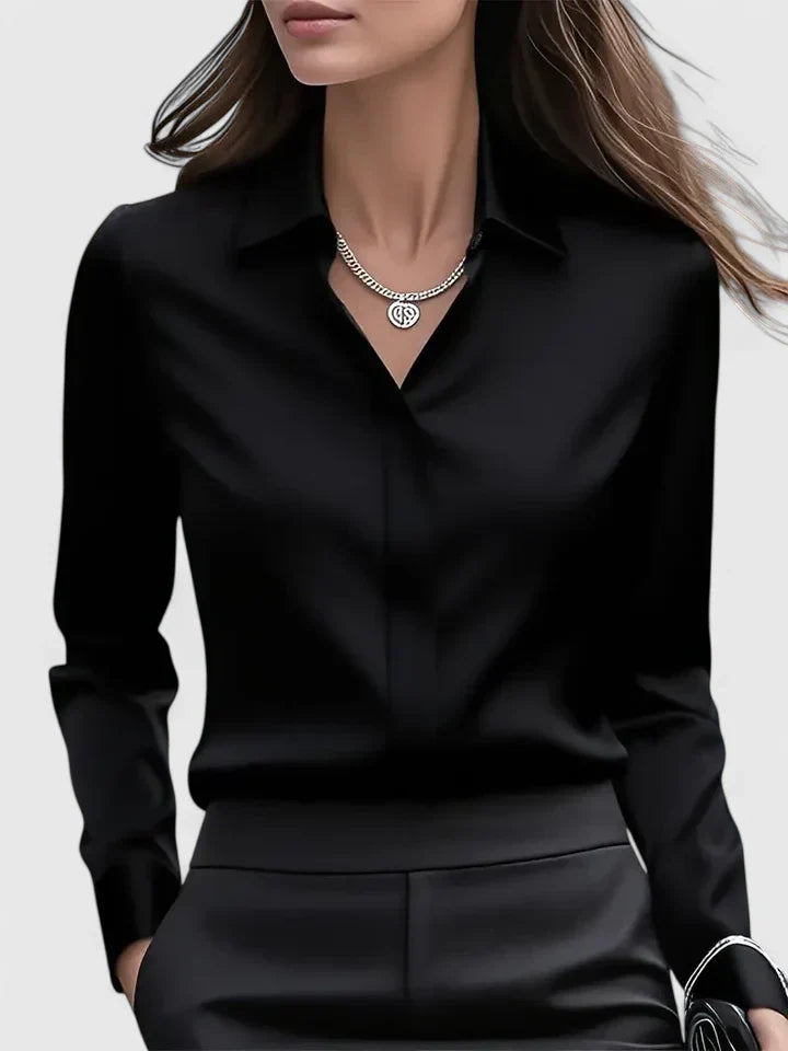 Elegant Melvaya top by Isabel y Miguel Madrid featuring a stylish design and premium fabric, shown on a white background.