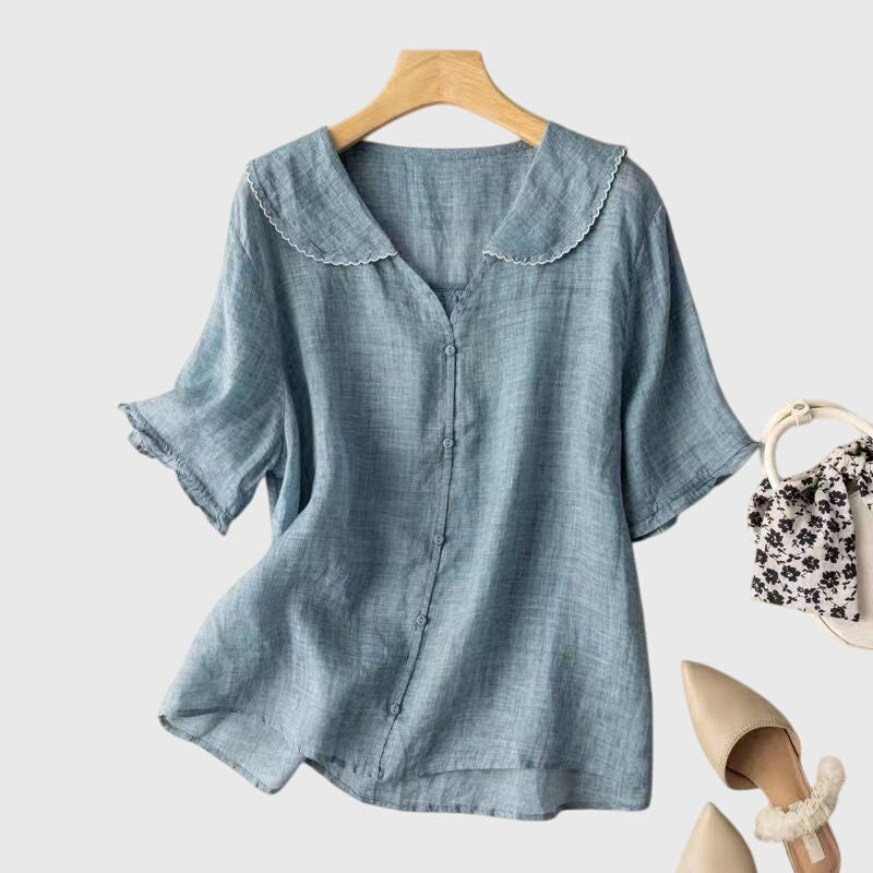 Elegant Adele™ blouse by Isabel y Miguel Madrid, featuring stylish design and quality fabric, shown in a well-fitted front view.