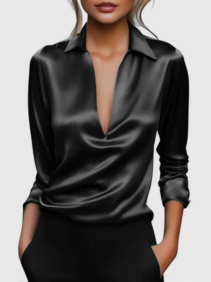 Elegant Isabel y Miguel Madrid Calvina blouse with sophisticated design, showcasing its stylish fabric and tailored fit.